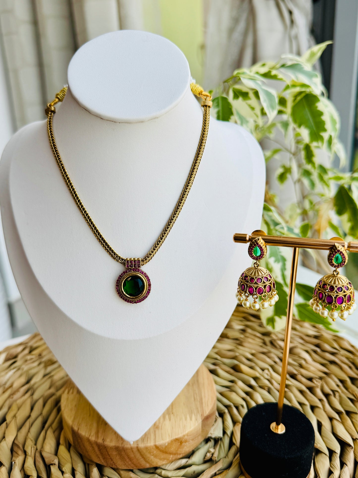 Elegant emerald stone pendant with jhumkas